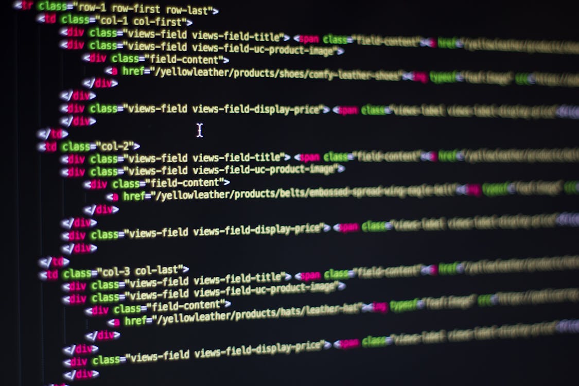 Website Design Checklist 2025: 32 Steps for a Flawless Launch 7 Close-up of HTML code on a black background, showing product links, prices, and images