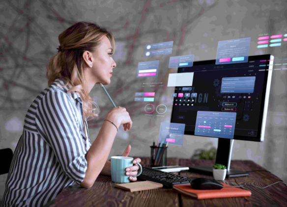 In-House Developer vs WordPress Agency: Which Should You Hire? 5 Woman working on a WordPress website design with UI elements on a modern computer screen